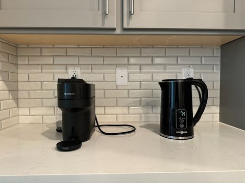 Nespresso machine (with pods included) and an electric kettle