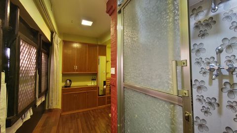 queen bed with attached bathroom