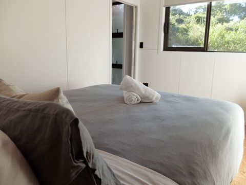 Bedroom with hotel quality bedding and linen