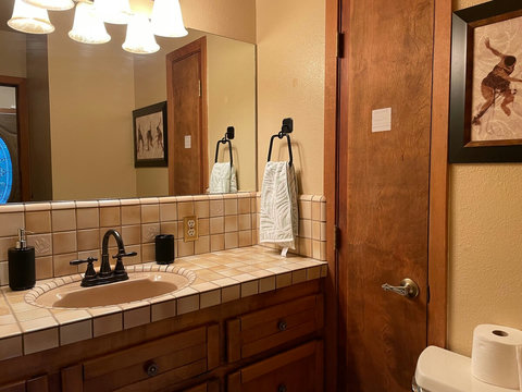 half bathroom in front of living room