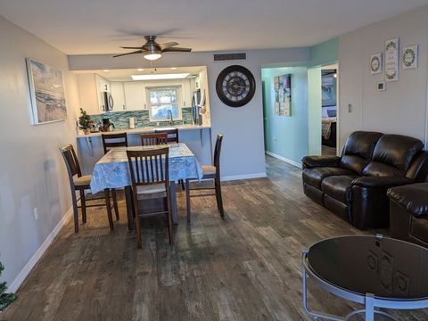 Open layout with Quartz Countertops Kitchen