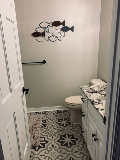 Second full bathroom located on lower level of home. This is situated by bedroom #3 and #4. This has shower only.