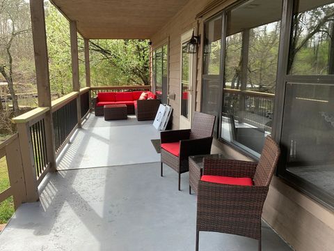 Seating area on lower balcony. Sectional located on both corners of lower balcony that seats 4-5. Also have 2 chairs with table. 