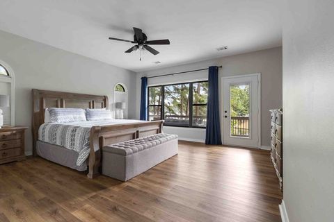 Master Bedroom with Lake Views. Has private Master Bathroom and walk in closet.