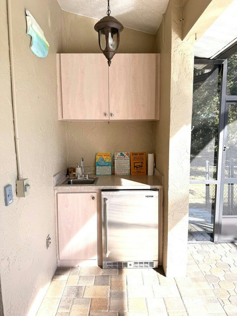 You can find a filet knife for your fish as well as grill tools in these cabinets. 