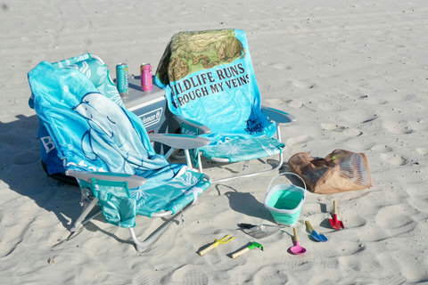 Two beach chairs, a giant cooler, a beach blanket, sand toys, and a beach bag for your day at the beach!