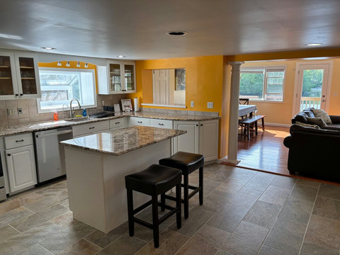 Kitchen is open to the dining table in the living room