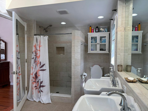 Master bathroom with large shower, and two sinks