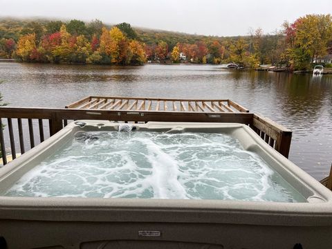 5-Person Hot Tub on the deck by the lake in fall