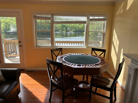 Game table in living room overlooking the lake