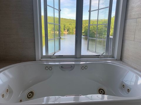 Jacuzzi in Master bathroom overlooking the lake