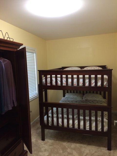 Bedroom-2 in 2nd-floor with full-over-full bunk bed and armory
