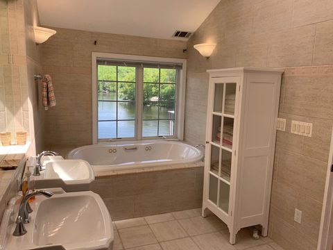 Master Bathroom with Jacuzzi overlooking the lake!