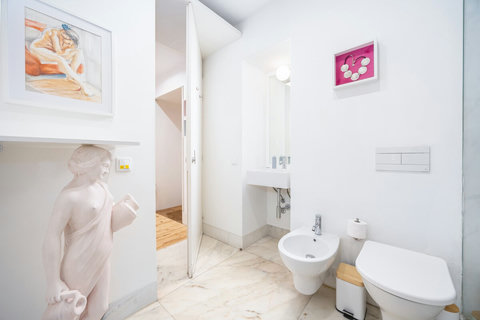 Large marble bathroom with walk-in rain shower. 24-hour high water pressure hot water. Toilet, bidet, washbasin and hair dryer.   Free toiletries : hand soap, shampoo, conditioner, and body soap and toilet paper.  Free quality towels.