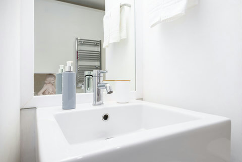 Large marble bathroom with walk-in rain shower. 24-hour high water pressure hot water. Toilet, bidet, washbasin and hair dryer.   Free toiletries : hand soap, shampoo, conditioner, and body soap and toilet paper.  Free quality towels.