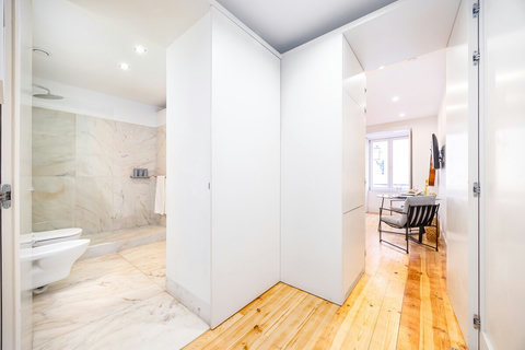 Large marble bathroom with walk-in rain shower. 24-hour high water pressure hot water. Toilet, bidet, washbasin and hair dryer.   Free toiletries : hand soap, shampoo, conditioner, and body soap and toilet paper.  Free quality towels.