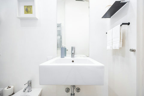 Marble bathroom with walk-in rain shower. High water pressure and hot water around the clock. Toilet, bidet, washbasin and hair dryer.   Free toiletries : hand soap, shampoo, conditioner, and body soap and toilet paper.  Free quality towels.