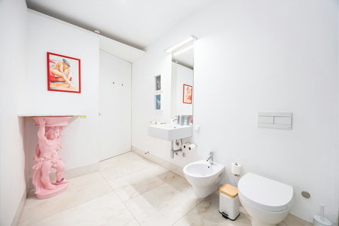 Large marble bathroom with walk-in rain shower. 24-hour high water pressure hot water. Toilet, bidet, washbasin and hair dryer.   Free toiletries : hand soap, shampoo, conditioner, and body soap and toilet paper.  Free quality towels. 