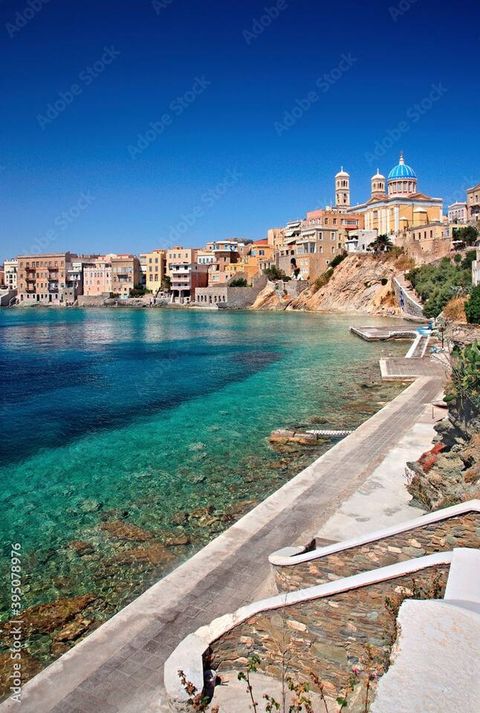 Vaporia" neighborhood and Asteria beach at Ermoupolis town, the capital of Syros island, Cyclades, Greece.
