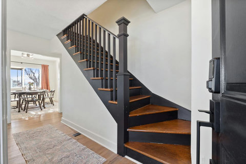 Staircase to near front door