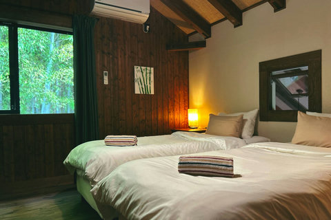 the two single beds can be pushed next to each other to make it a large double bed for couples

this is the only bedroom with an Air Conditioner.
in the summer, we just keep all the bedroom doors open.
