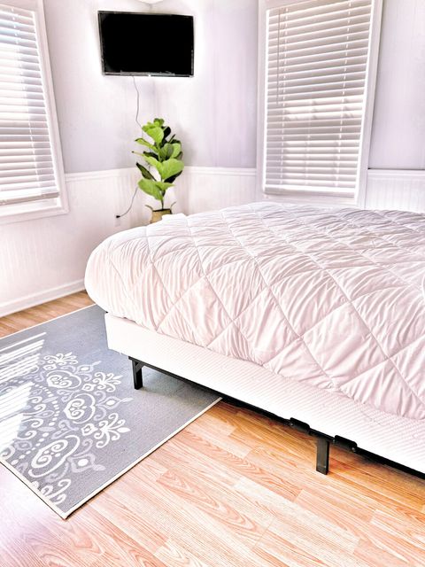 Master Bedroom with plush brand new Queen bed and fresh white linens & 32" Smart TV