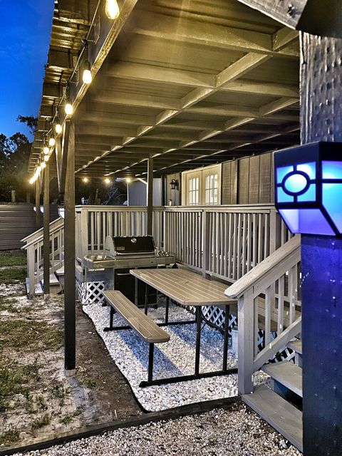 BBQ Day or Night, rain or shine under patio covering. In privacy fenced back yard!