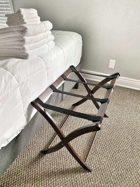 Master Queen Size plush brand new bed and luggage rack.