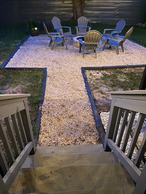 Deck stairway to firepit.