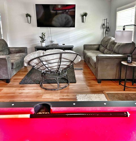 Living area with papasan chair. View from pool table 