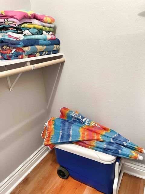 Beach Towels, Umbrellas & Cooler in Master Closet