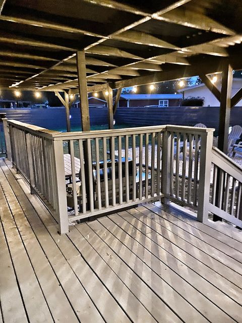 Covered Deck auto lit string lights at night.