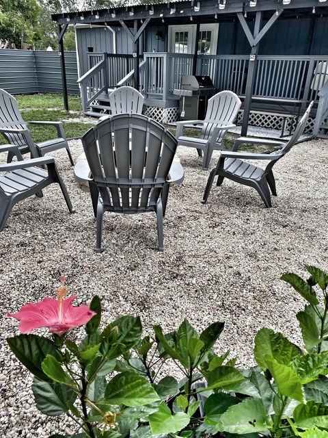 Fire pit in privacy fenced back yard 