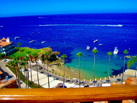 - Mesmerizing bird’s eye view of turquoise waters, swaying palms, and anchored yachts
- Watch beachgoers below or boats cruising by from your private balcony
- Postcard worthy moment from sunrise to sunset, right outside your door