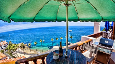 - Sip something special beneath the shade as sailboats drift across the horizon
- Panoramic views of turquoise waters and palms set the scene for pure escape
- Your private balcony comes with a grill and unbeatable island vibes
