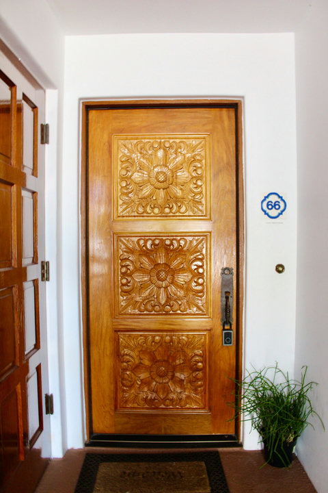 Enter through a beautifully hand carved wooden door that sets the tone for your stay.