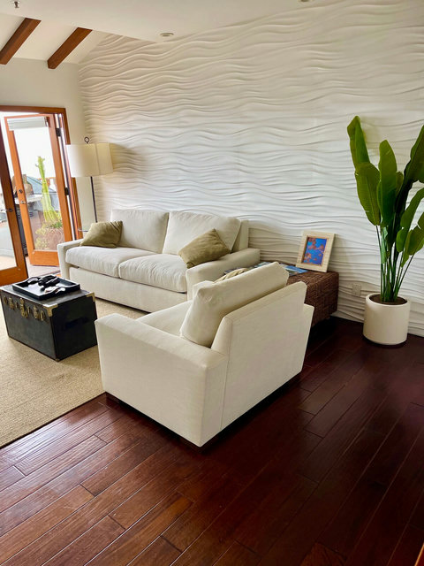 - Sink into comfort with deep cushioned sofas set against a sculpted, wave inspired wall
- Natural textures and leafy accents create a serene, exclusive lounge space
- Perfect for sipping wine, reading, or relaxing after a day in the sun