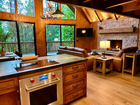 - Gather around the fire & take in the soaring windows, wooded views & rustic elegance
- Chef’s kitchen meets cozy lodge vibes, perfect for cooking, sipping & staying in
- Leather lounges to stone finishes, every detail invites you to slow down & sav