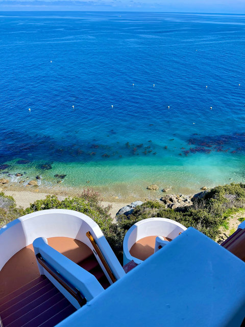 - Spiral stairs lead directly to a serene shoreline with crystal clear waters
- Soak in breathtaking panoramic ocean views from your private cliffside perch
- Wake up to peaceful waves and stroll down to your very own stretch of beach
