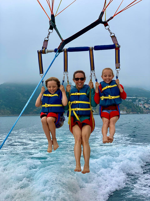 Soar above the sea and share a thrilling parasailing adventure with your favorite crew.

