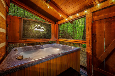 Hot tub is completely enclosed for privacy and protection. 