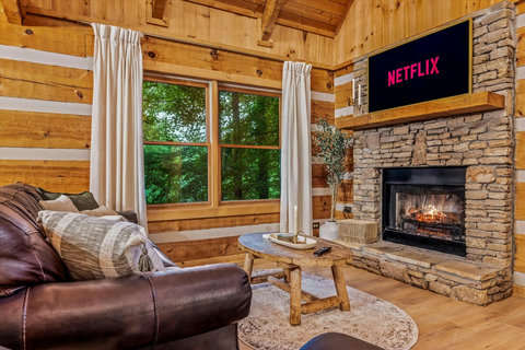 Cozy electric fireplace and candles surround 