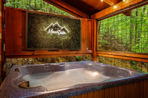 Hot tub with the perfect back drop to remember your Smokies vacation! 