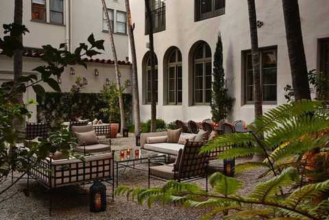 The Palm Garden, Villa Carlotta’s central courtyard, is replete with lush landscaping and fountain features for a tranquil urban refuge.