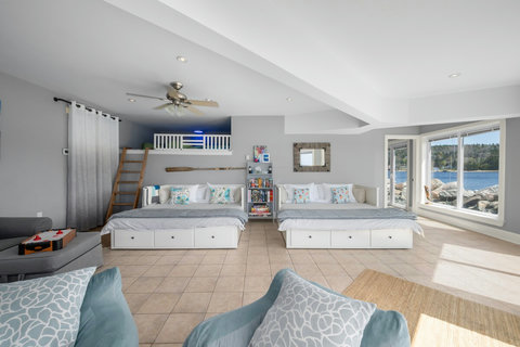Stowaway's room. 2 King beds + kids loft. 2.5 shared bathrooms. 