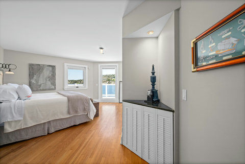 Captain's room. King feather bed, ensuite bath with soaker tub and shower.  H2O Infuse Shampoo, conditioner, body wash and lotion. 