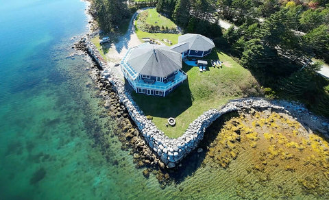 The Land Yacht sits on 1 acre of Atlantic ocean shoreline. The private tidal cove is ideal for launching kayaks (included) and searching for sea glass. (Water shoes suggested.)