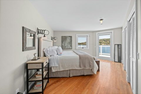 Captain's room. King feather bed, ensuite bath with soaker tub and shower.  H2O Infuse Shampoo, conditioner, body wash and lotion. 