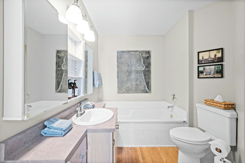 Captain's room ensuite with soaker tub and shower. H2O Infuse amenities.