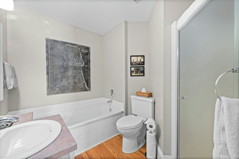 Captain's room ensuite with soaker tub and shower. H2O Infuse amenities.